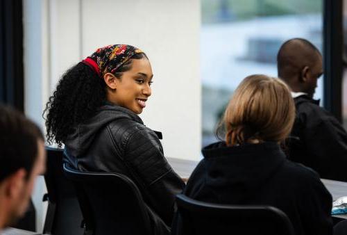 Students chat in the IDEA Space in Helmke library.